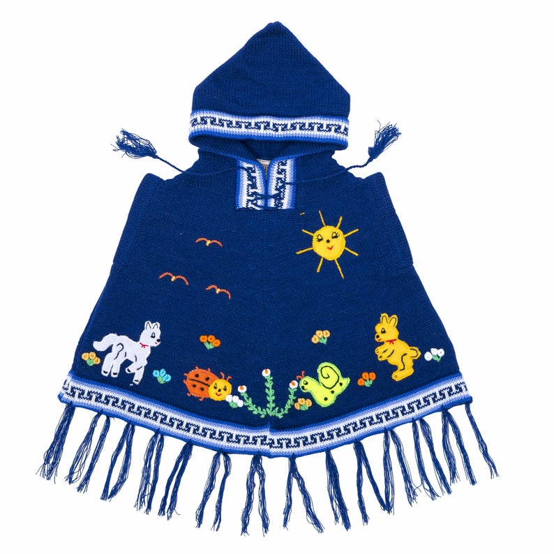 A blue children's poncho with hood featuring colorful animal patterns and a sun design on the back.