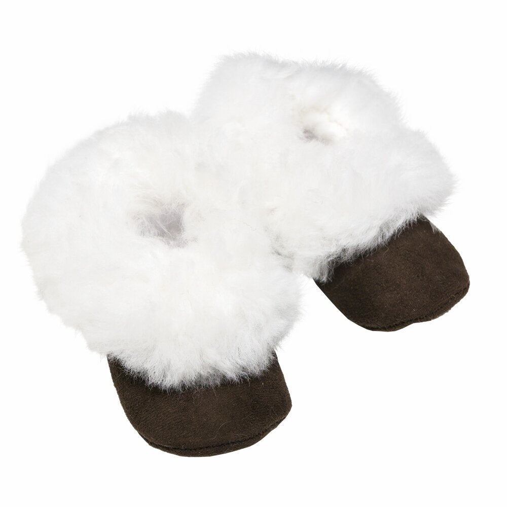 A pair of children's alpaca fur slippers with brown soles and white fur trim.