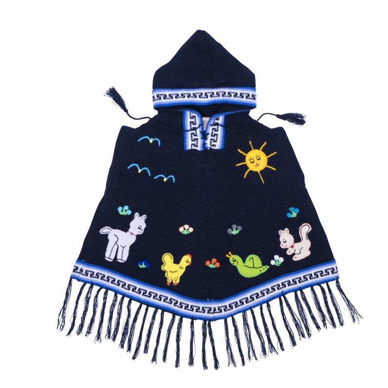 A dark blue children's poncho with hood featuring colorful animal patterns and a fringed edge.